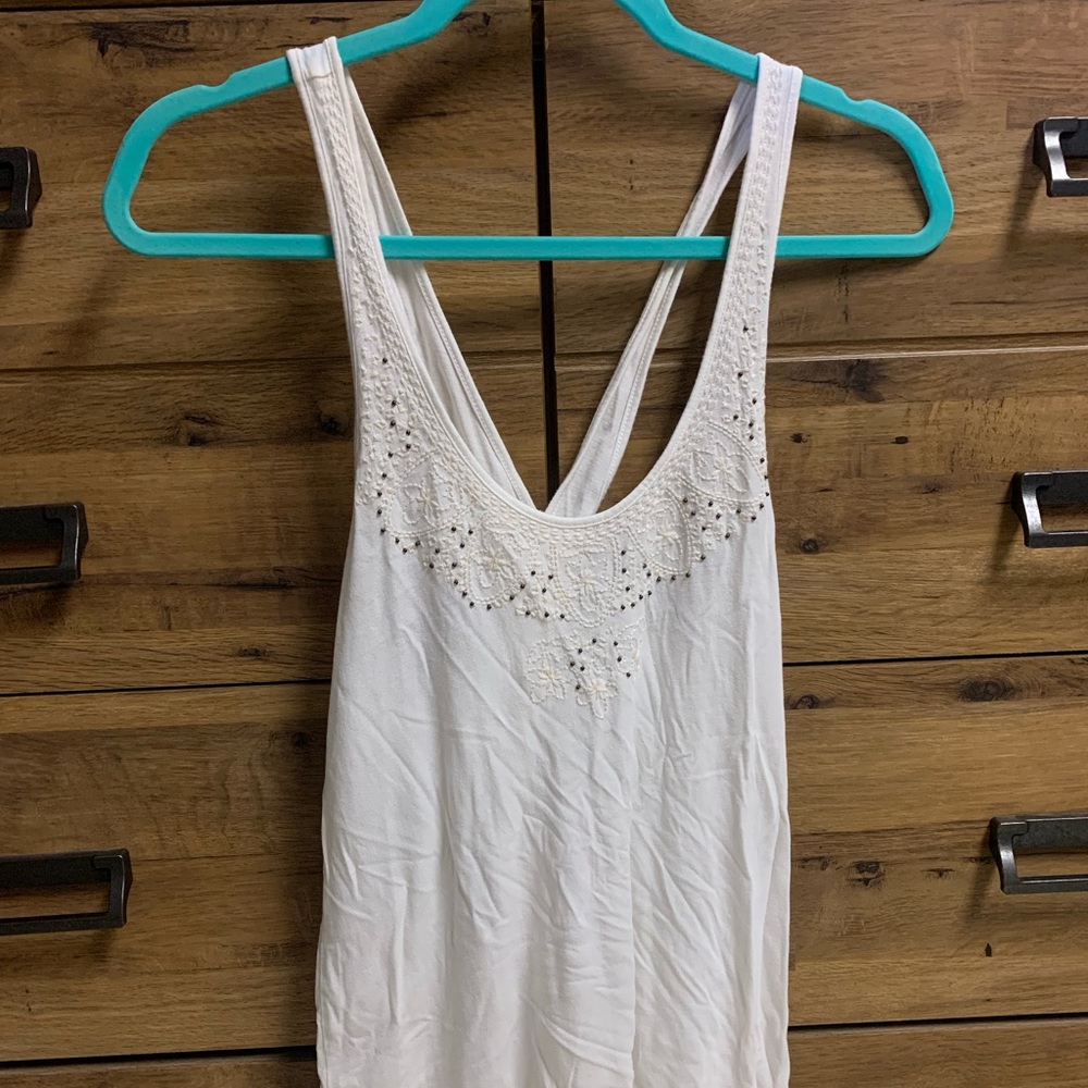 White Tank top with cross cross back. American Eagle.
